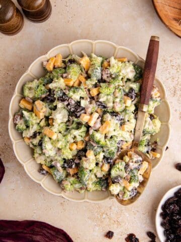 Broccoli Salad with Cranberries from above with a serving spoon in the bowl
