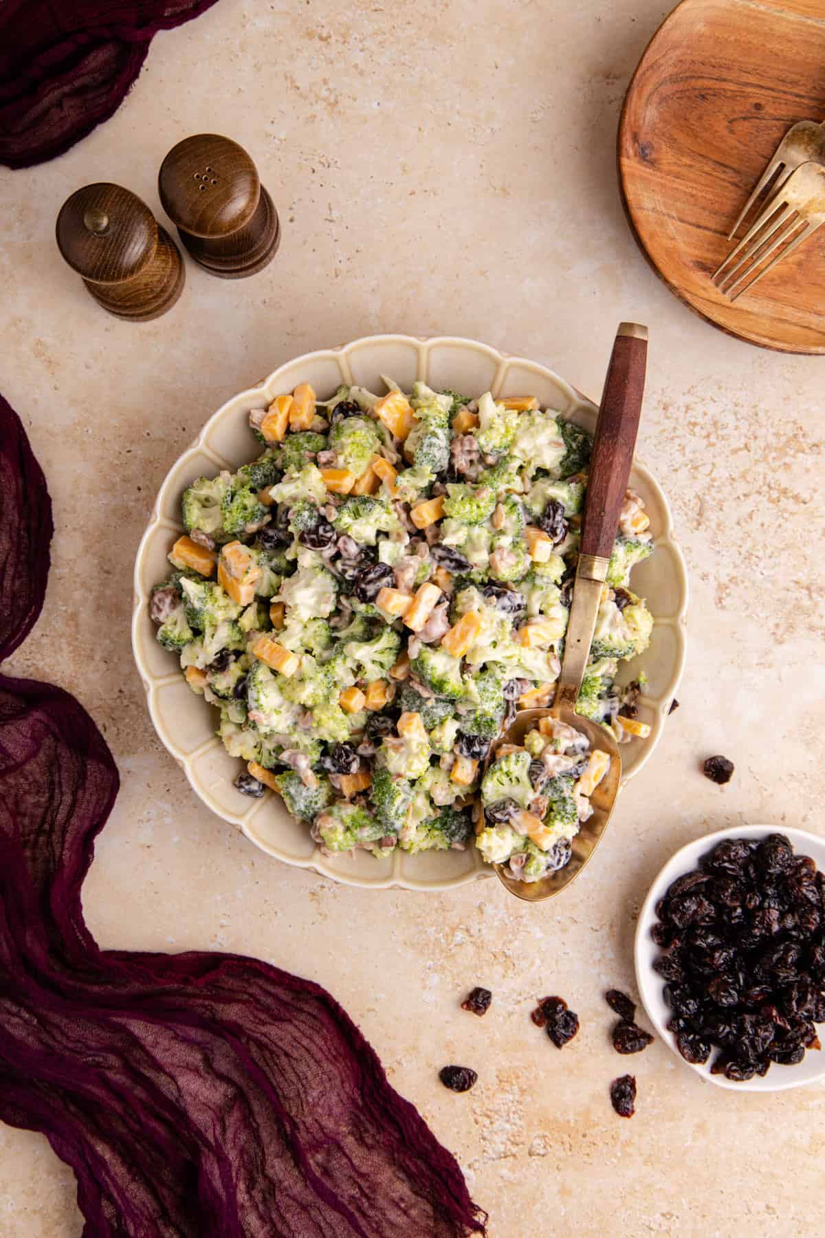 Broccoli Salad with Cranberries from above with a serving spoon in the bowl