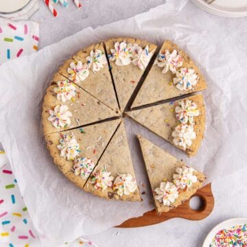 Chocolate chip cookie cake from above with slices all cut