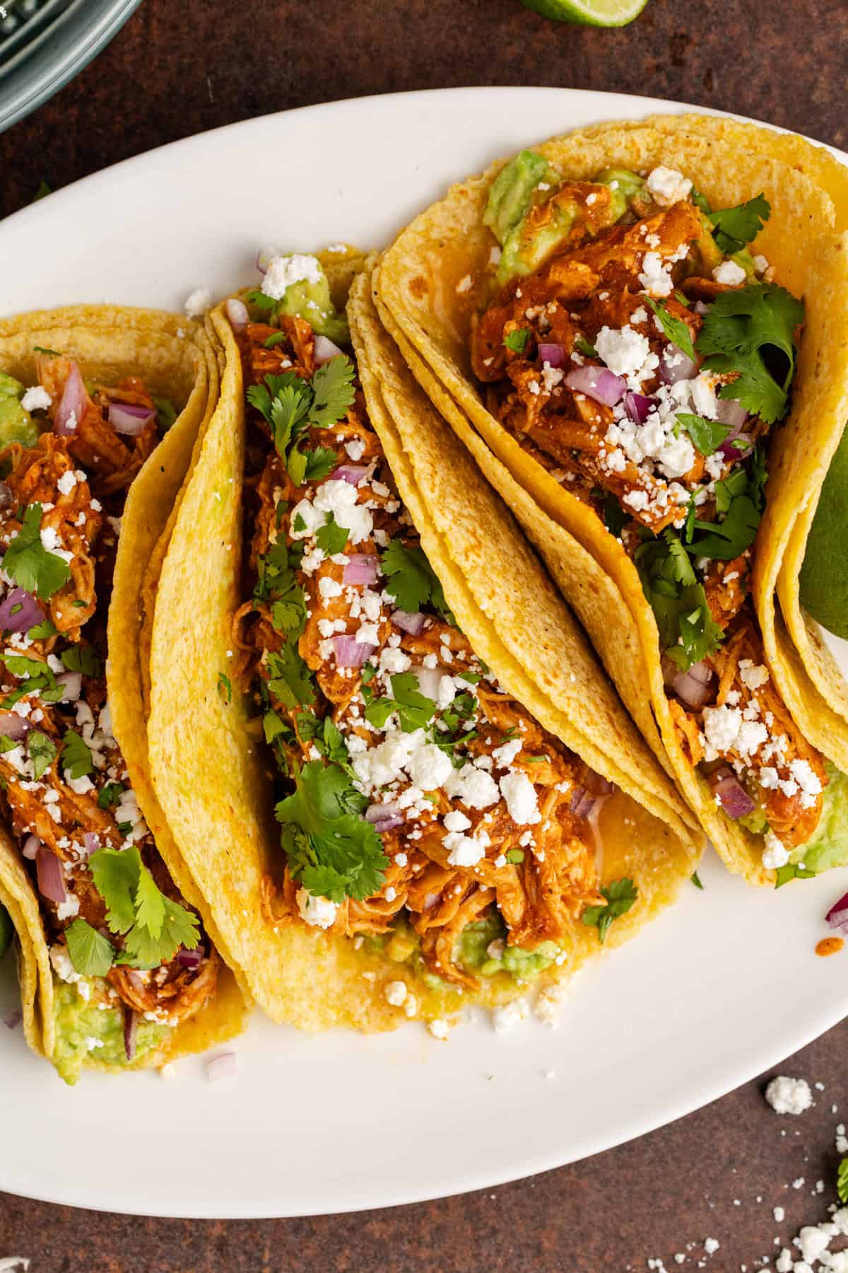 Instant Pot Chicken Tinga Tacos on a platter up close