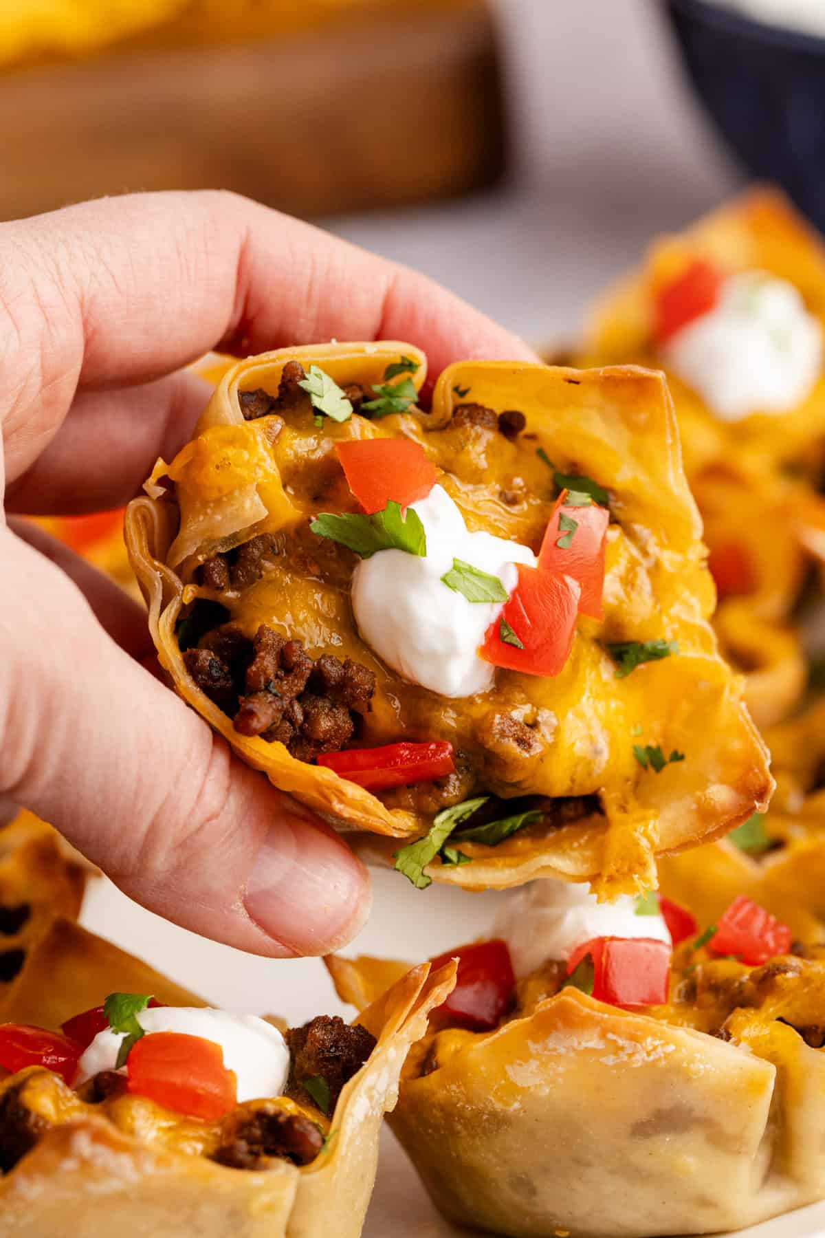 Mini Taco Cups being picked up