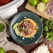 Tostados de Tinga from overhead with a slow cooker in the back