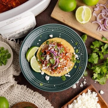 Tostados de Tinga from overhead with a slow cooker in the back