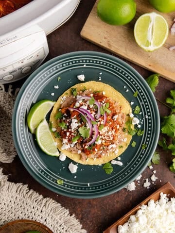 Tostados de Tinga from overhead with a slow cooker in the back