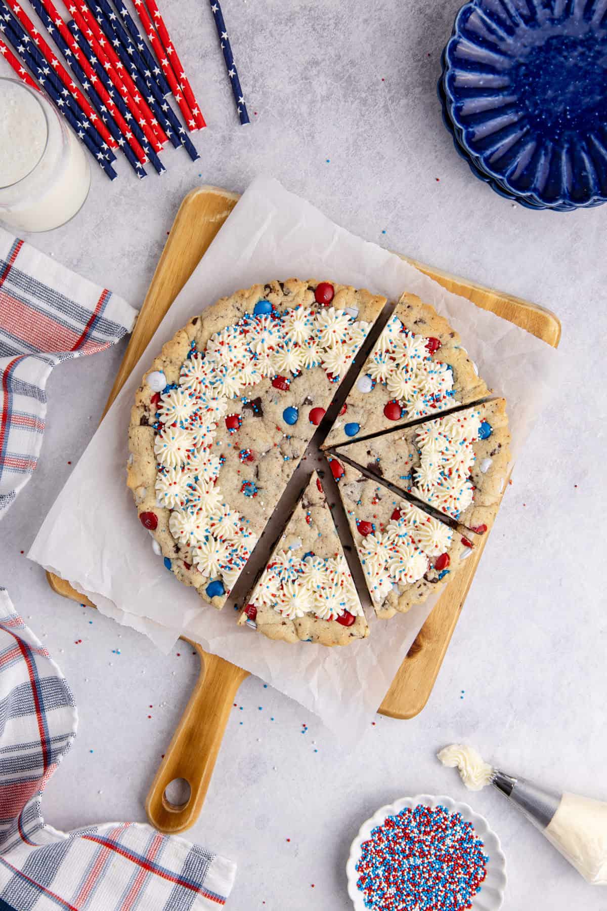 Red White and Blue Cookie Cake from above with half cut into slices