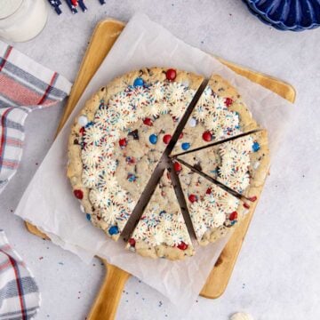 Red White and Blue Cookie Cake from above with half cut into slices