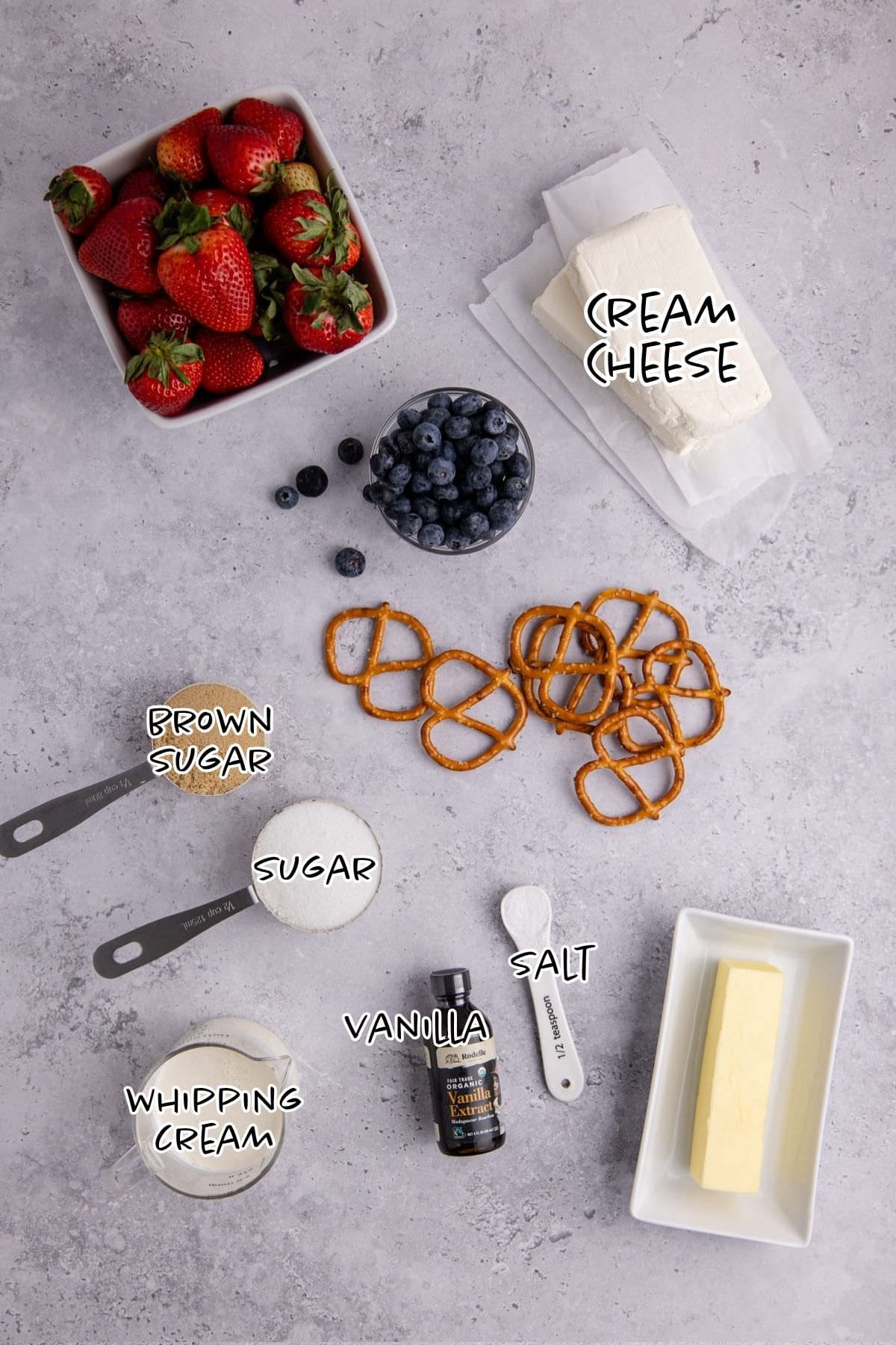 Red, White and Blue Pretzel Salad Ingredients on a counter