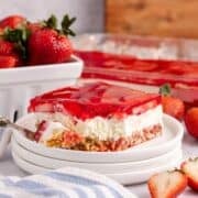 Strawberry Pretzel Salad on a plate with a fork beside