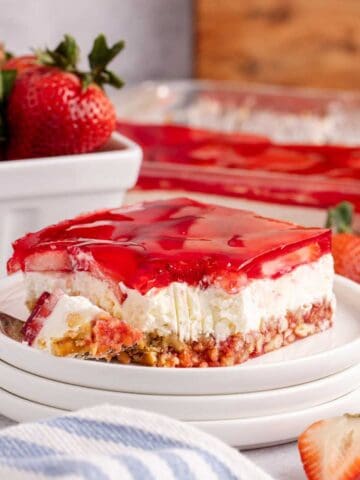 Strawberry Pretzel Salad on a plate with a fork beside