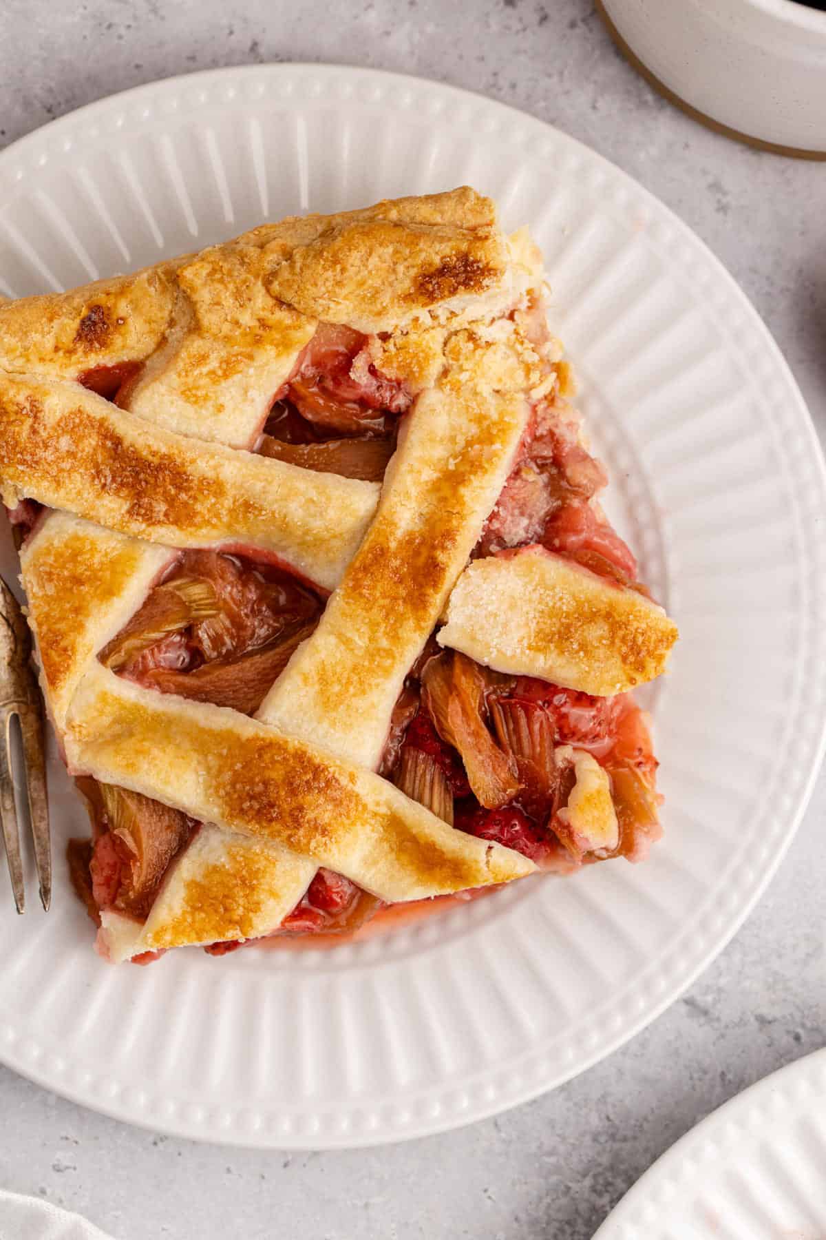 Strawberry Rhubarb Slab Pie on a plate close up