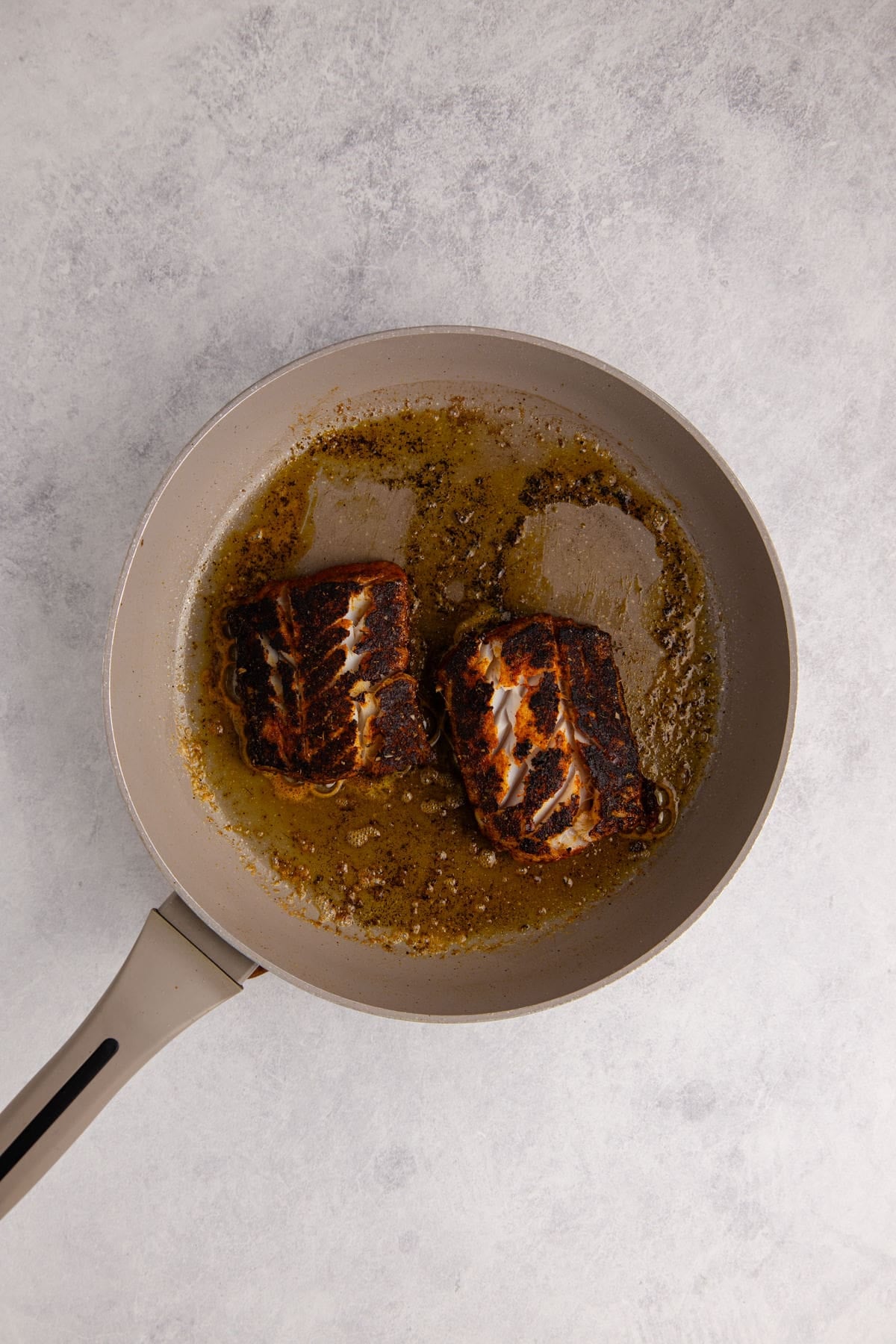 Blackened Cod being cooked for tacos