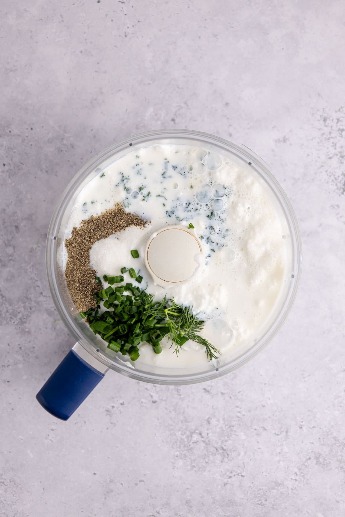 Cottage Cheese Ranch Dip being made in a food processor