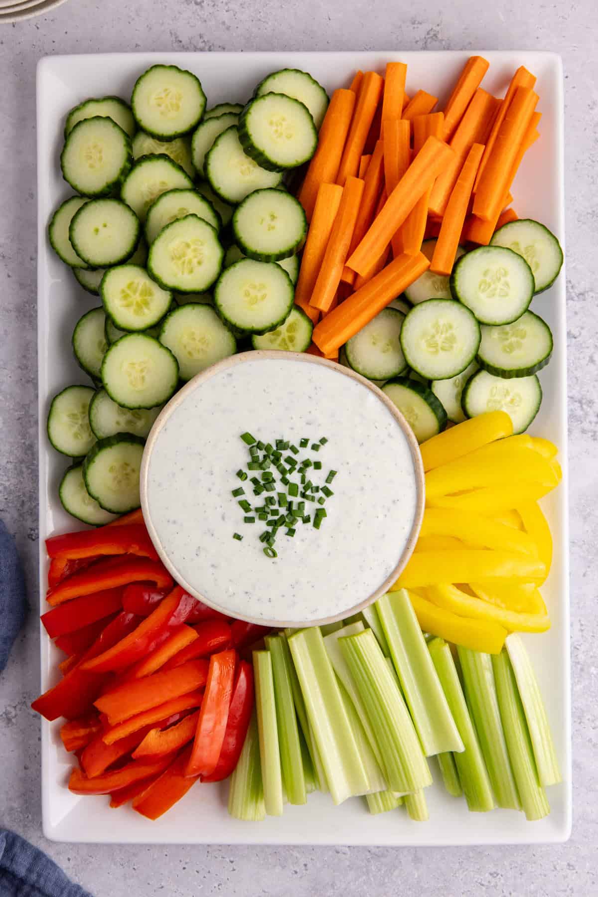 Cottage Cheese Ranch Dip on a tray in a serving bowl from above