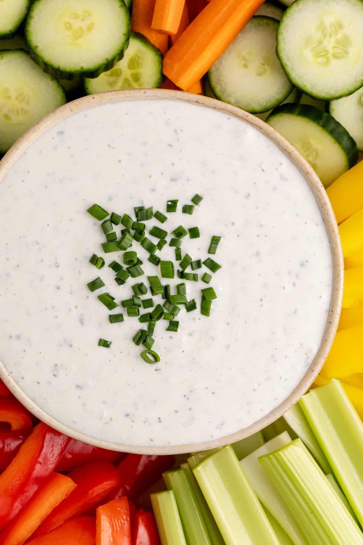 Cottage Cheese Ranch Dip on a tray in a serving bowl from above