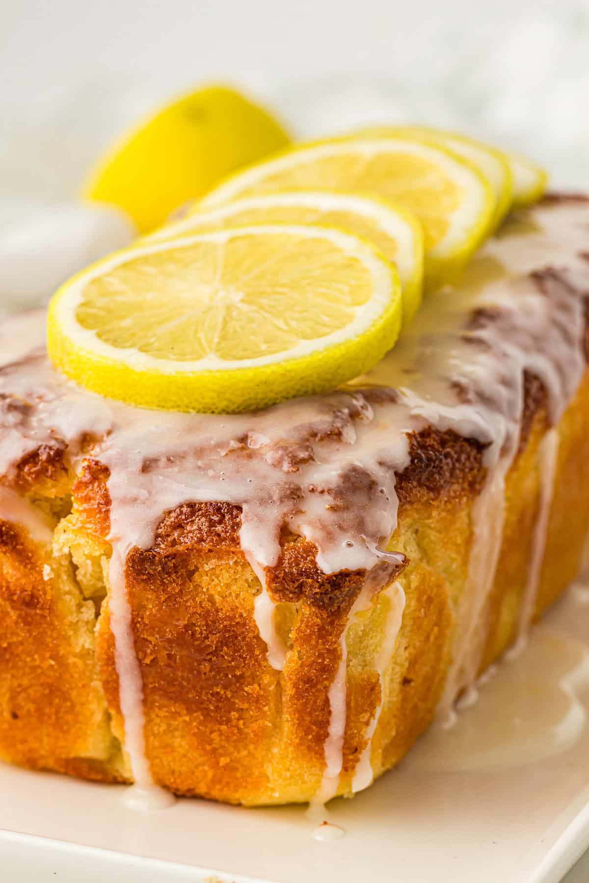 Old Fashioned Lemon Pound Cake with lemon slices on top