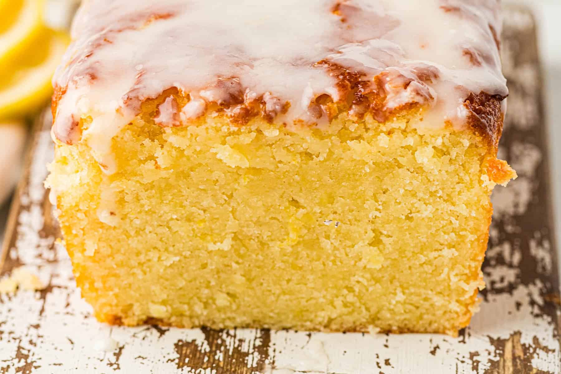 Old Fashioned Lemon Pound Cake sliced to show the moist inside