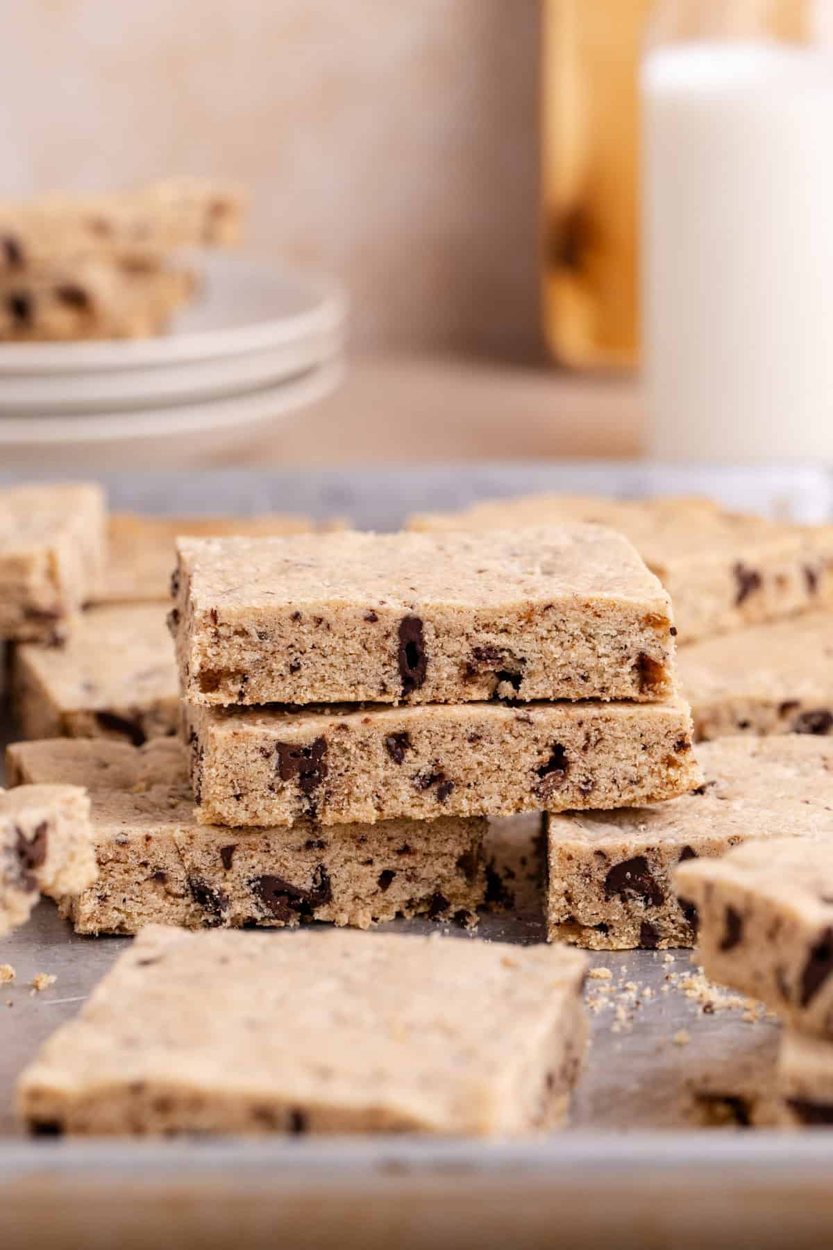 Sheet Pan Chocolate Chip Cookies stacked on a pan