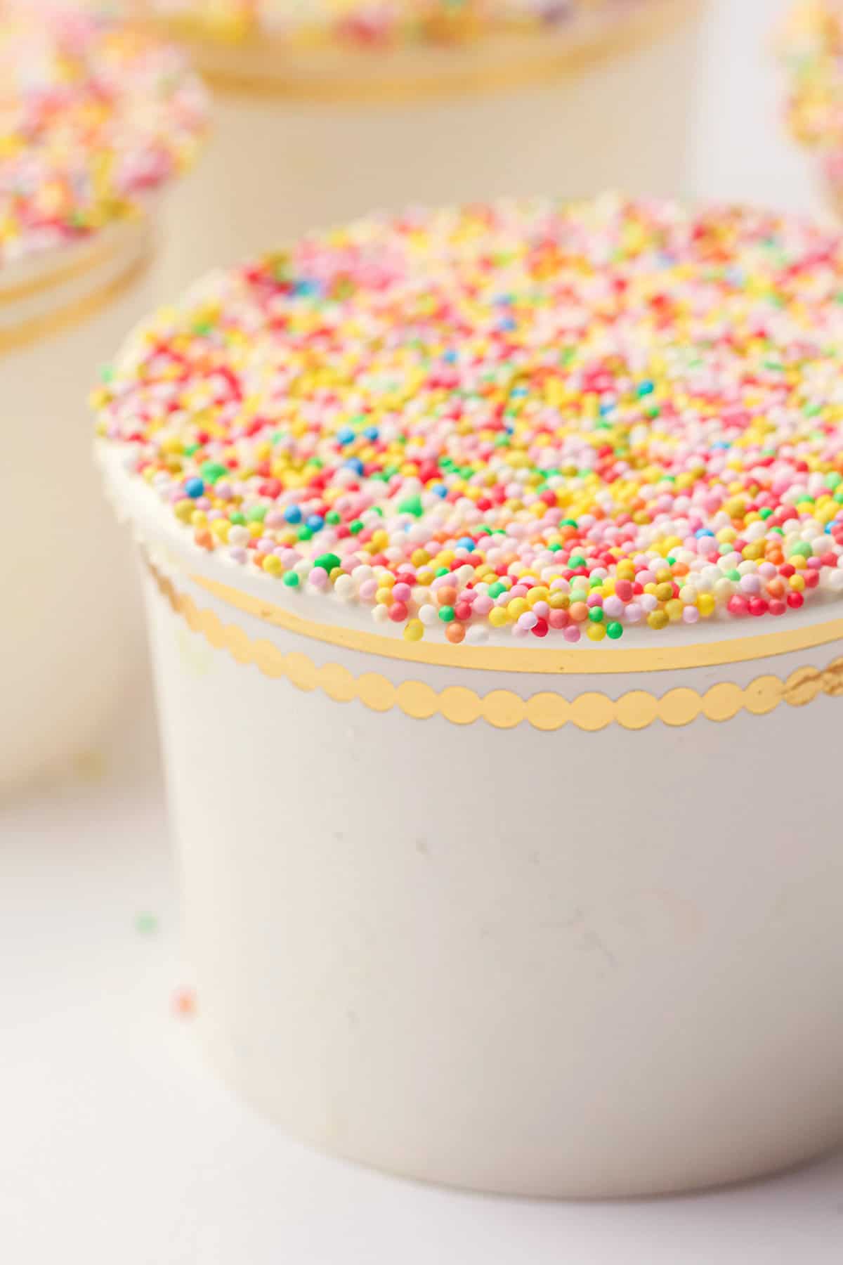Viral Dot Cake in Cups with rainbow sprinkles up close