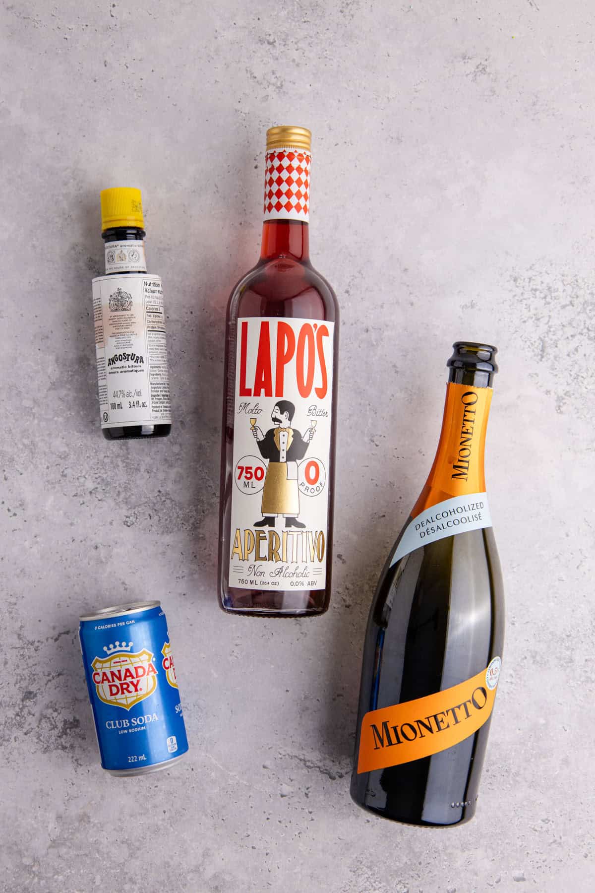 Aperol Spritz Mocktail Ingredients on a counter
