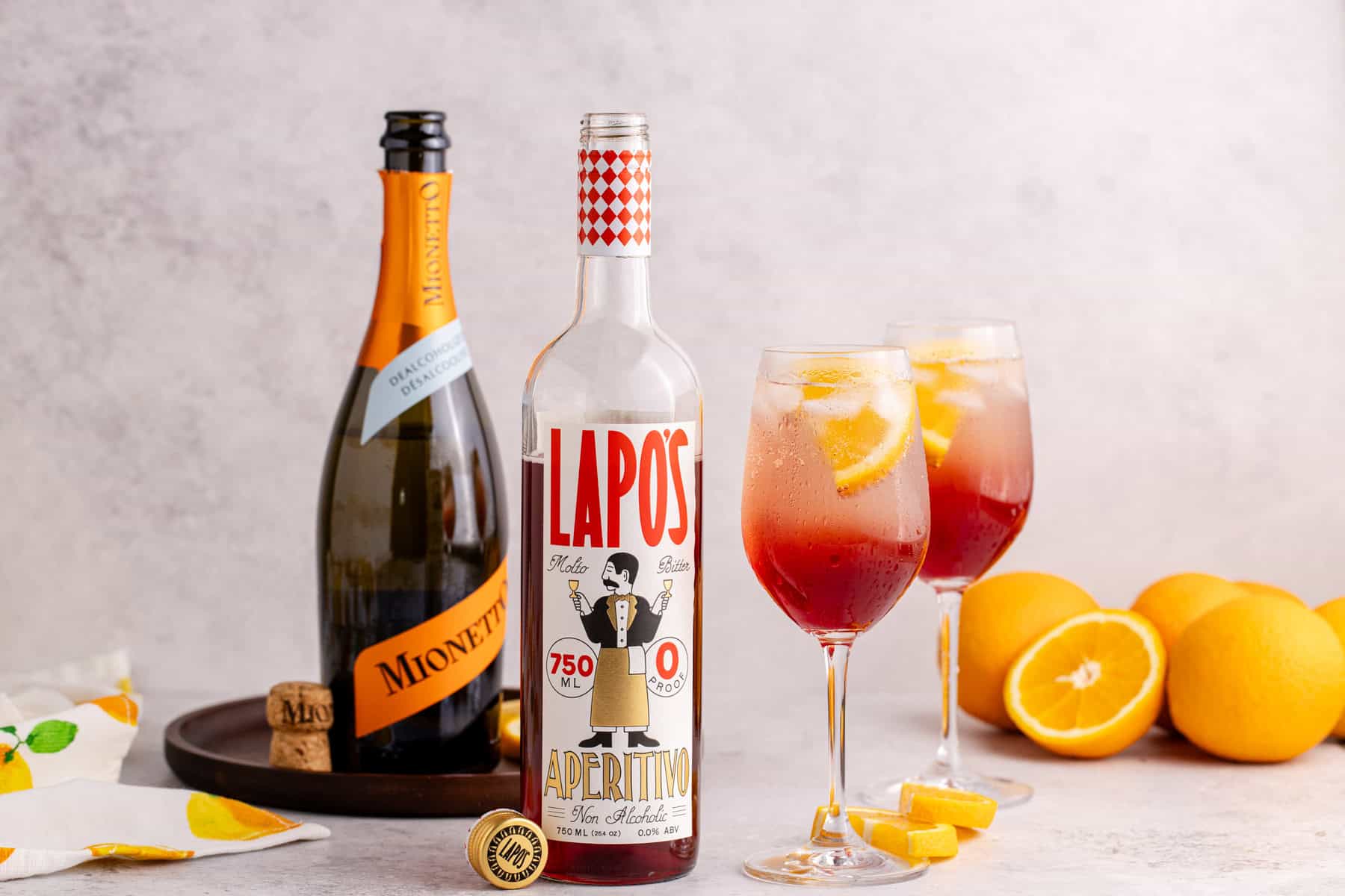 aperol spritz mocktails in wine glasses