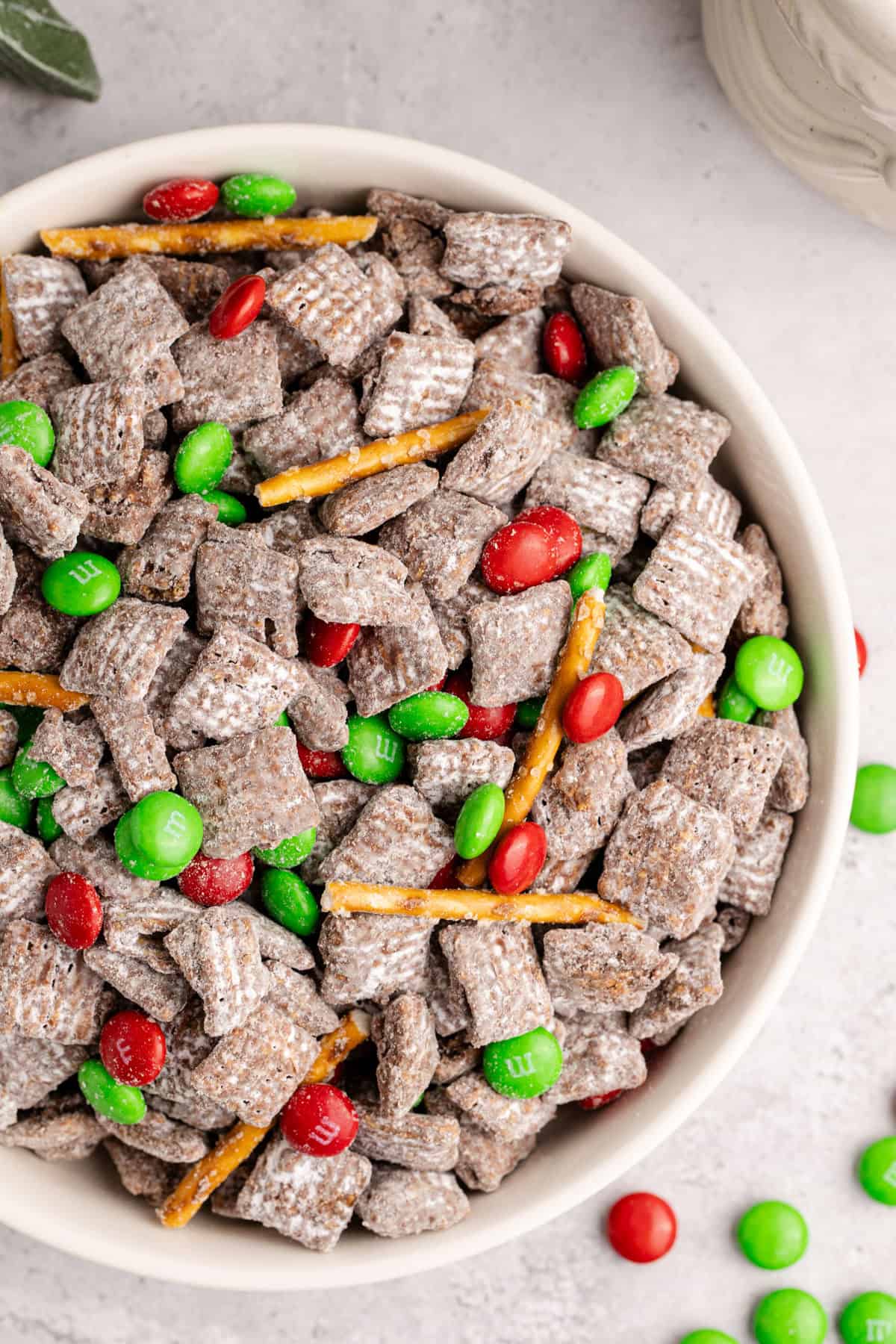 Christmas Puppy Chow in a festive serving bowl from above