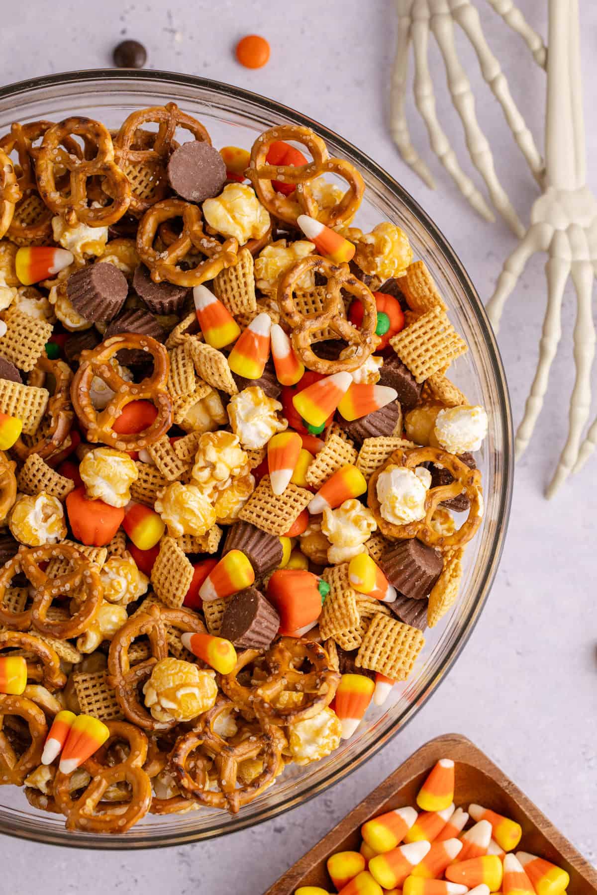 close up of large serving bowl full of halloween snack mix