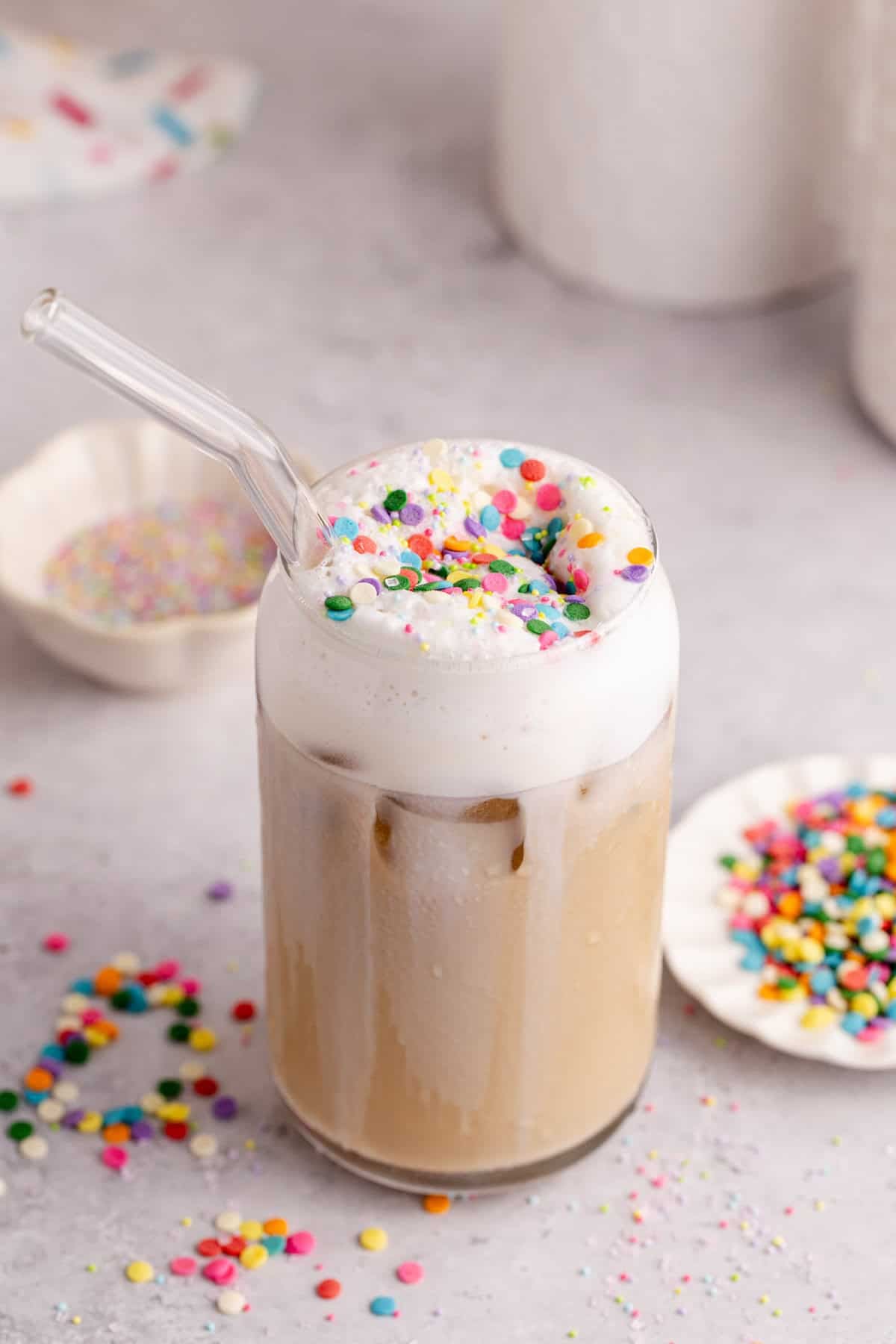 Whimsical Latte on a counter to see colorful sprinkles on the top