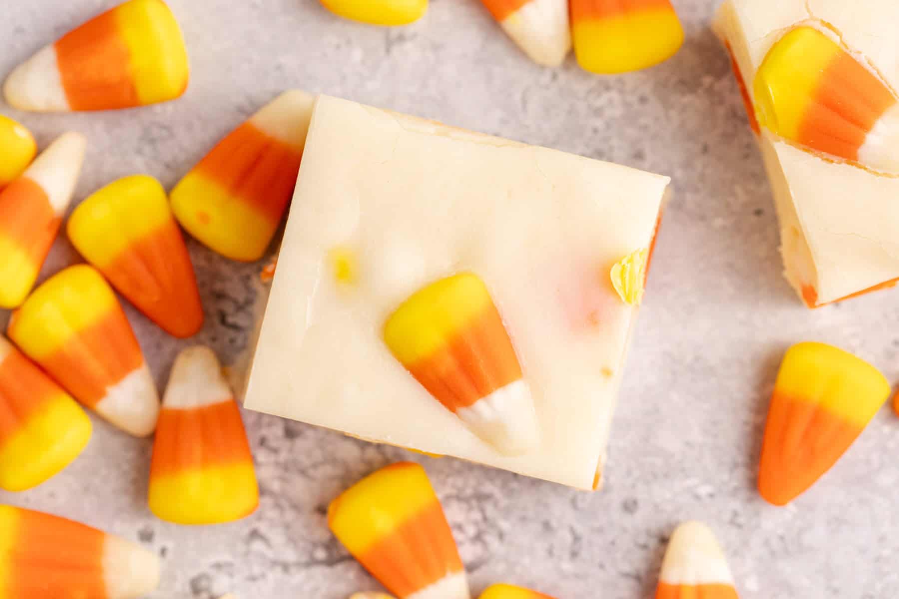 white chocolate candy corn fudge with candy corn beside