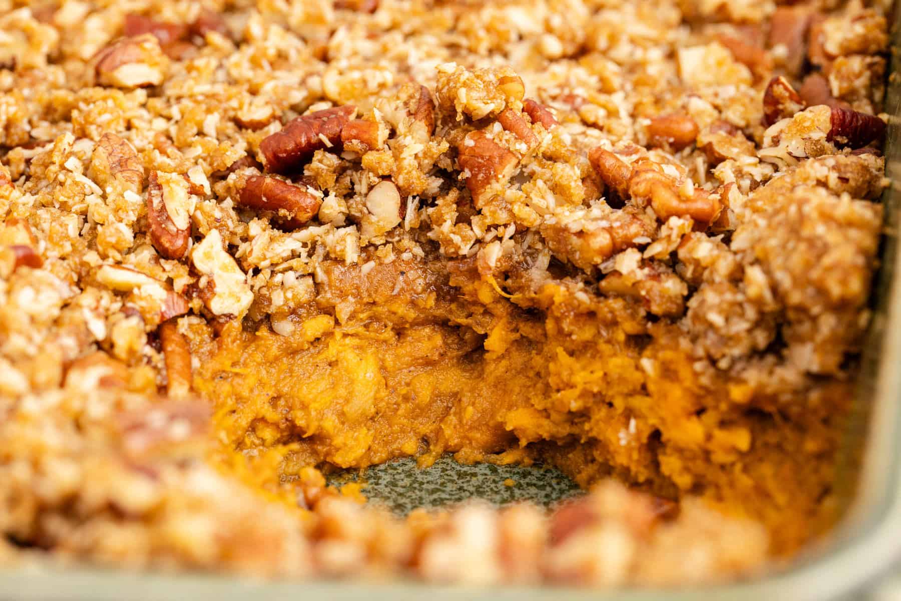 Sweet Potato Casserole with Pumpkin baked up close with some taken and seeing the layers