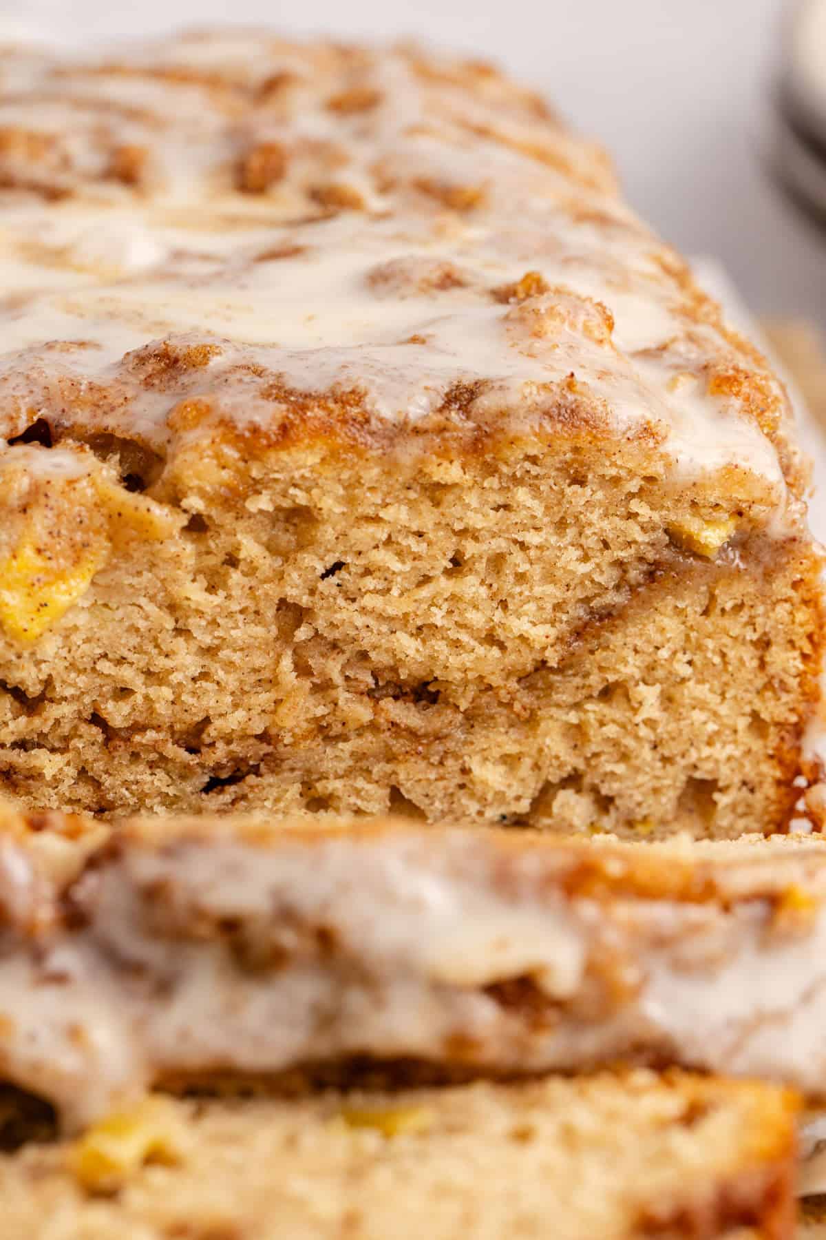 Apple Fritter Quick Bread straight on seeing the inside of the loaf