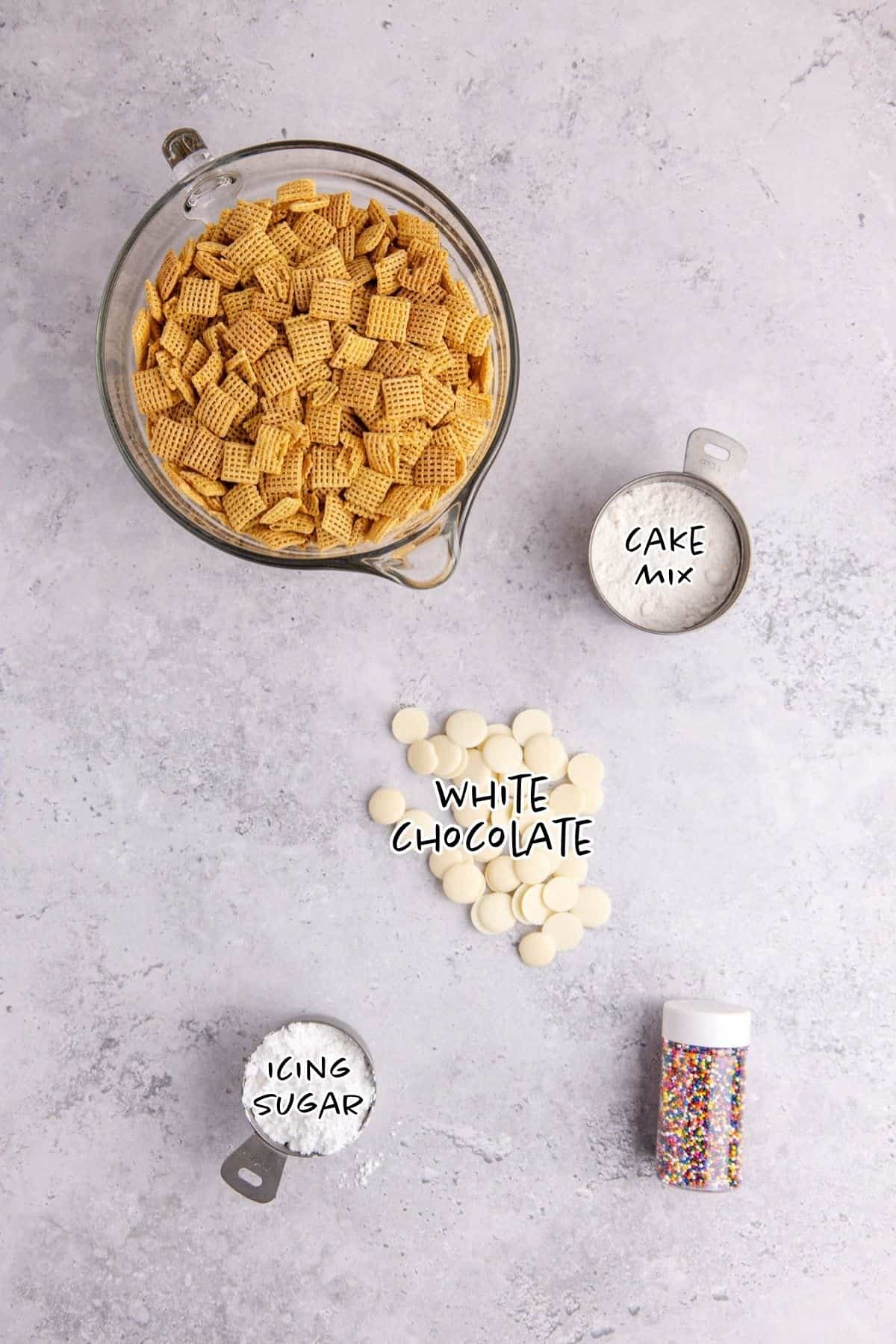 Cake Batter Puppy Chow Ingredients on a counter