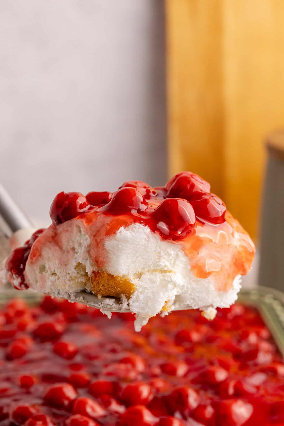 Cherries in the Snow on a serving spoon over the final dish