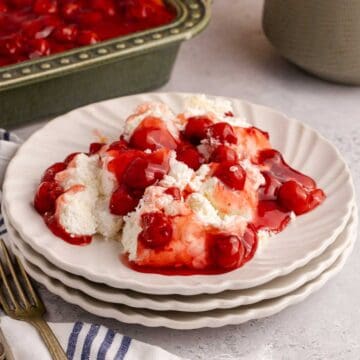 Cherries in the Snow on a plate with a casserole dish in the back