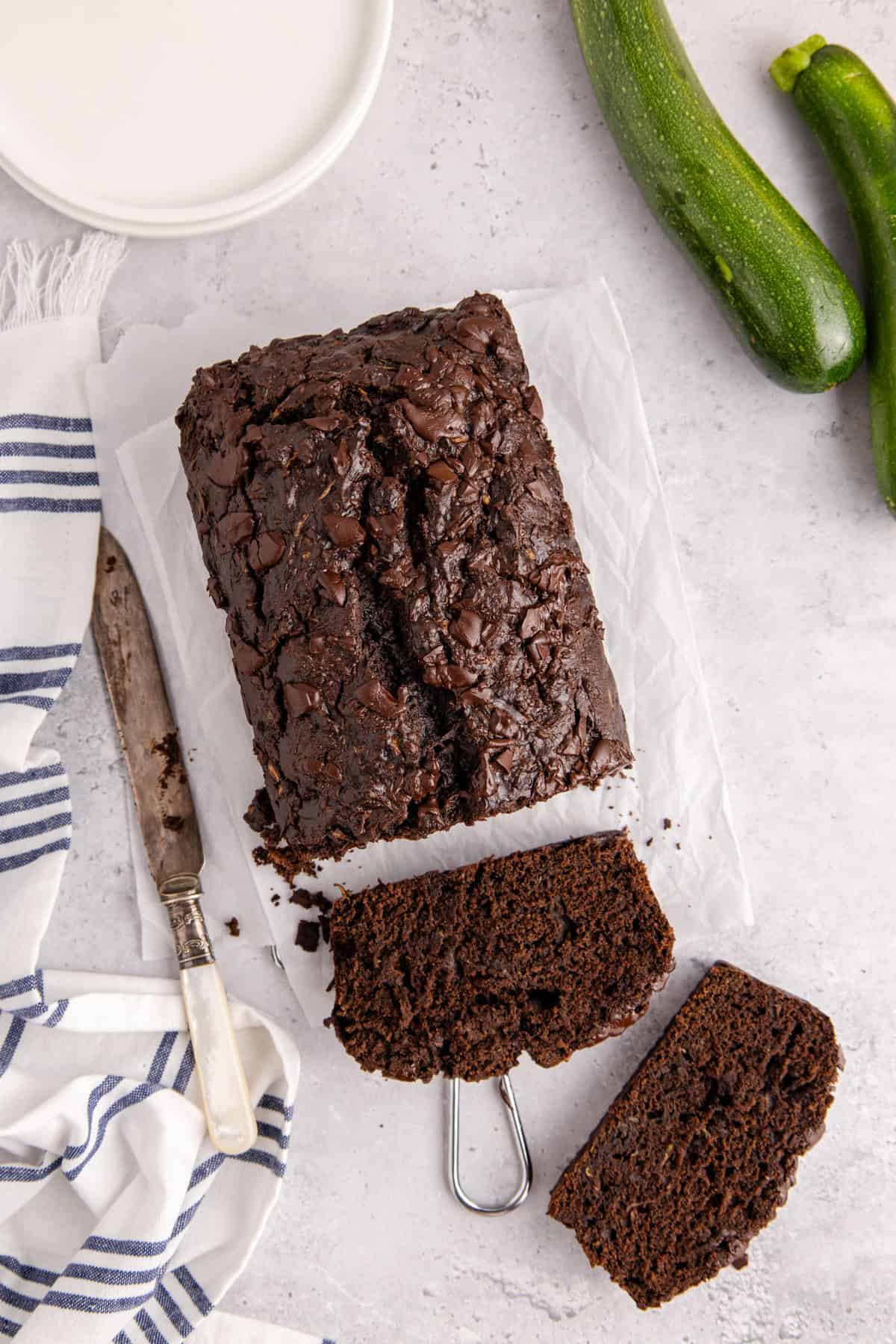 Chocolate Zucchini Loaf from above with slices laying in front
