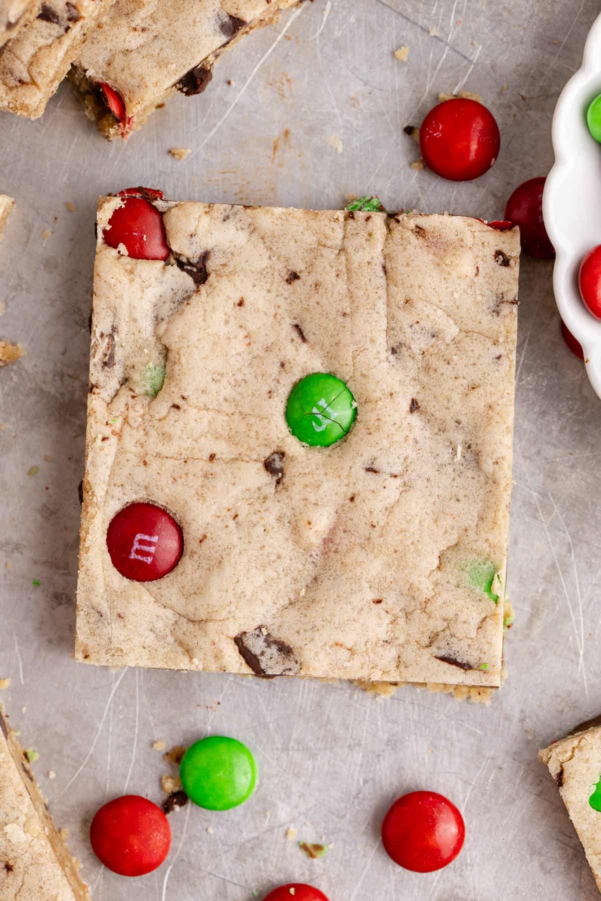 Christmas M&M Cookie Bar up close on a sheet pan