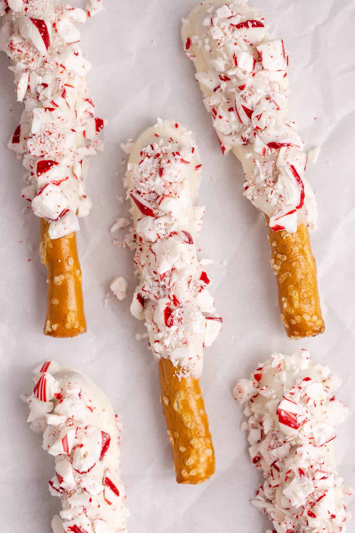 Christmas Pretzel Rods on parchment paper from above