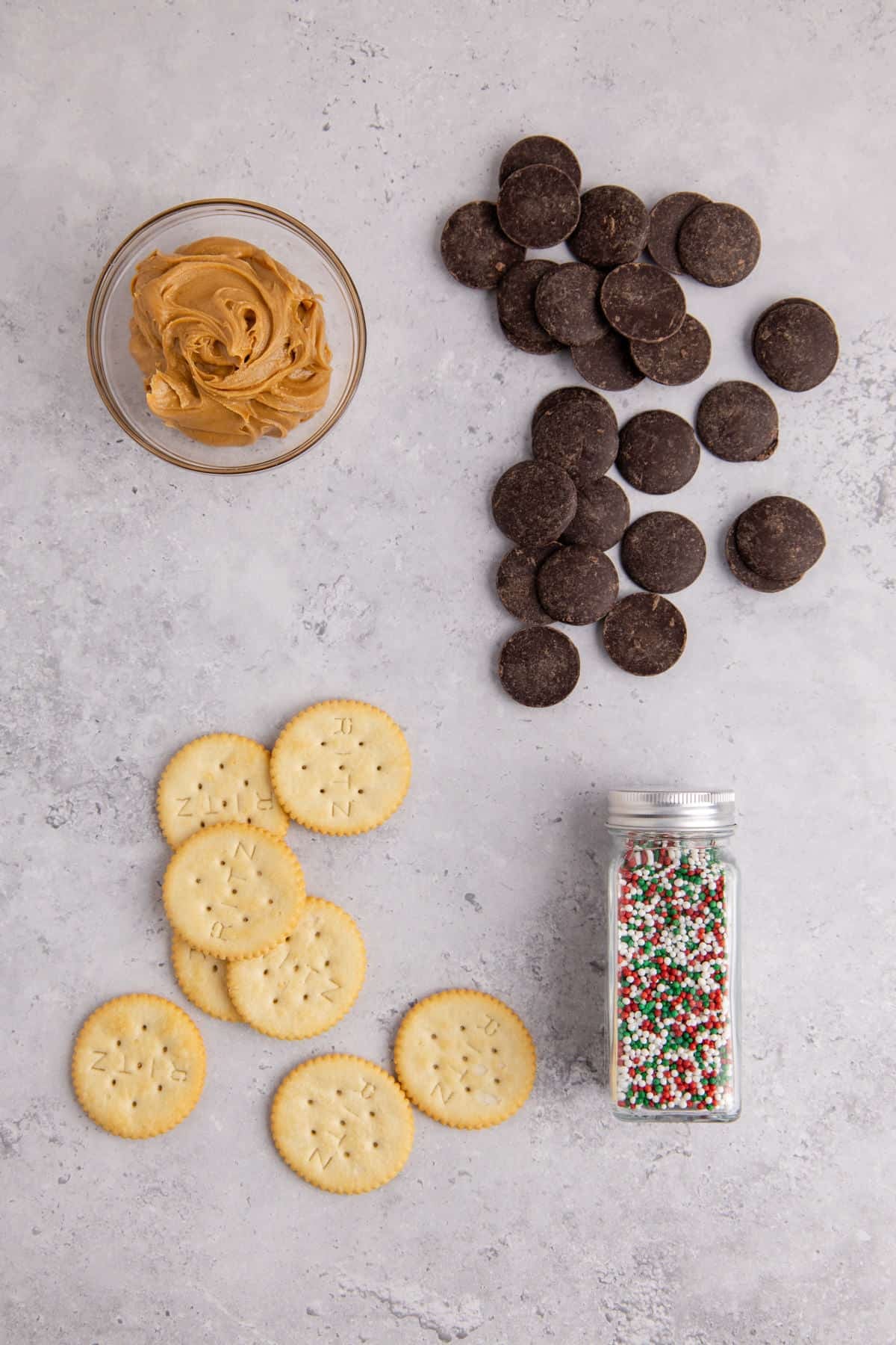 Ritz Cracker Christmas Cookies ingredients on a counter