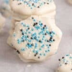 White Chocolate Ritz Cracker Cookies with a cookie leaning against a stack