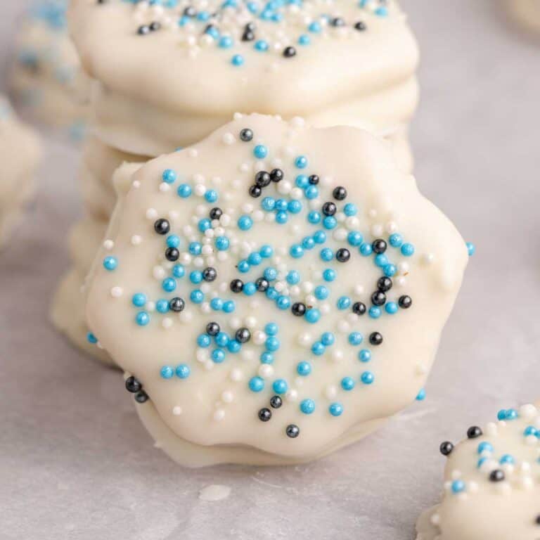 White Chocolate Ritz Cracker Cookies with a cookie leaning against a stack