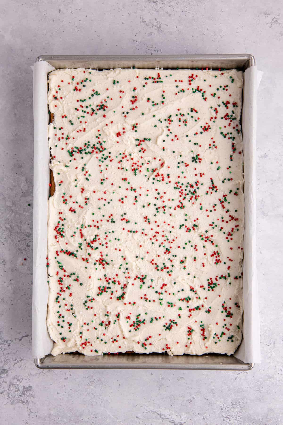 Gingerbread Cookies Bars with Icing in a 9x13 metal pan